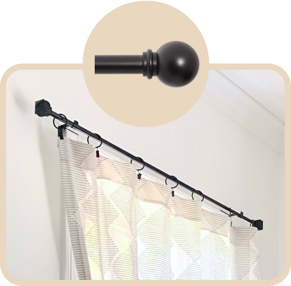 Black Kwik-Hang rod brackets with 1" Mission rods installed on a window