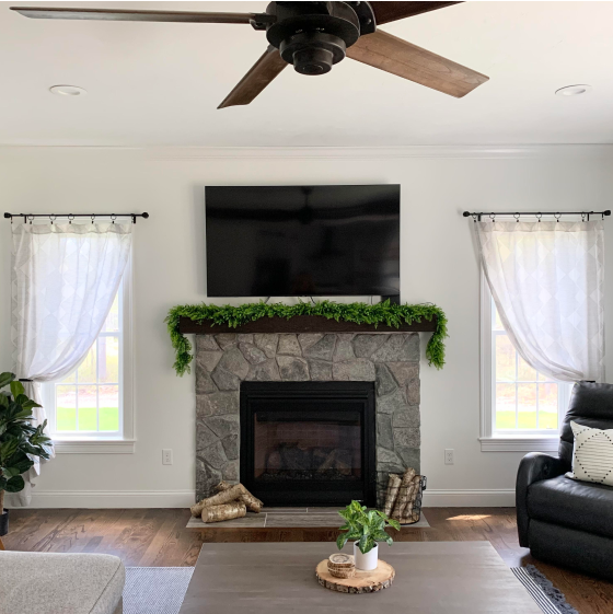 Kwik-Hang brackets, rods and holdbacks installed in a living room